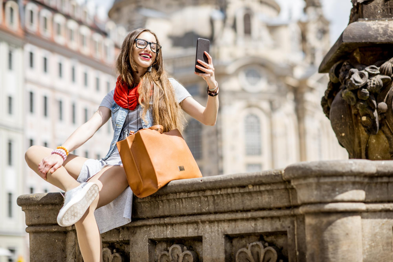 Young woman using smart phone.jpg